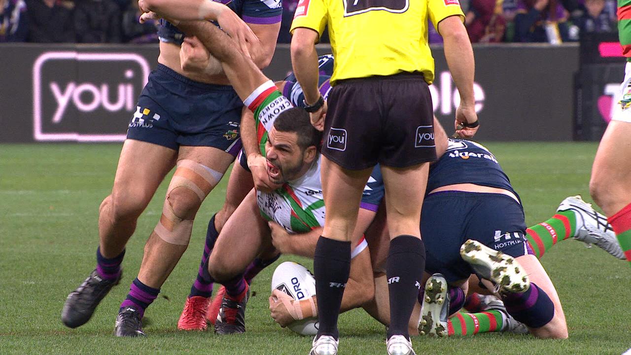 Greg Inglis is put in an awkward position.