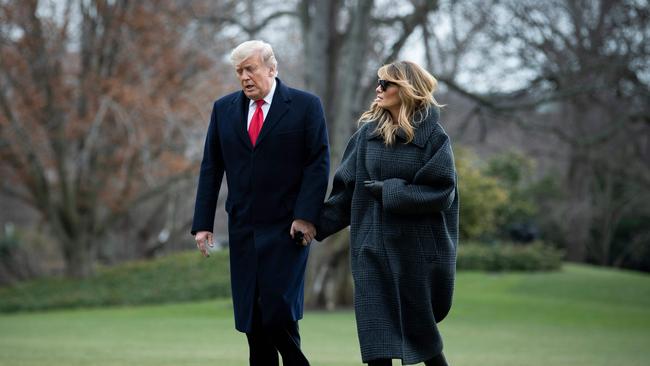 Outgoing US President Donald Trump, with First Lady Melania Trump, “stoked a culture of intolerance and division”. Picture: AFP