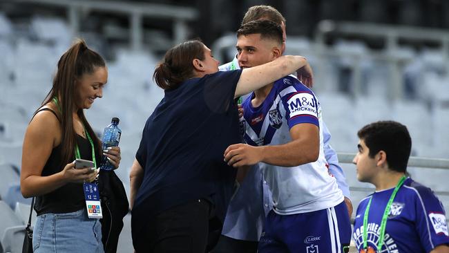 A hug from his mum after a job well done.