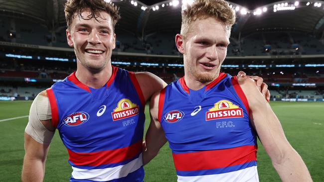 Josh Dunkley and Adam Treloar celebrate after tonights win. Picture: Michael Klein