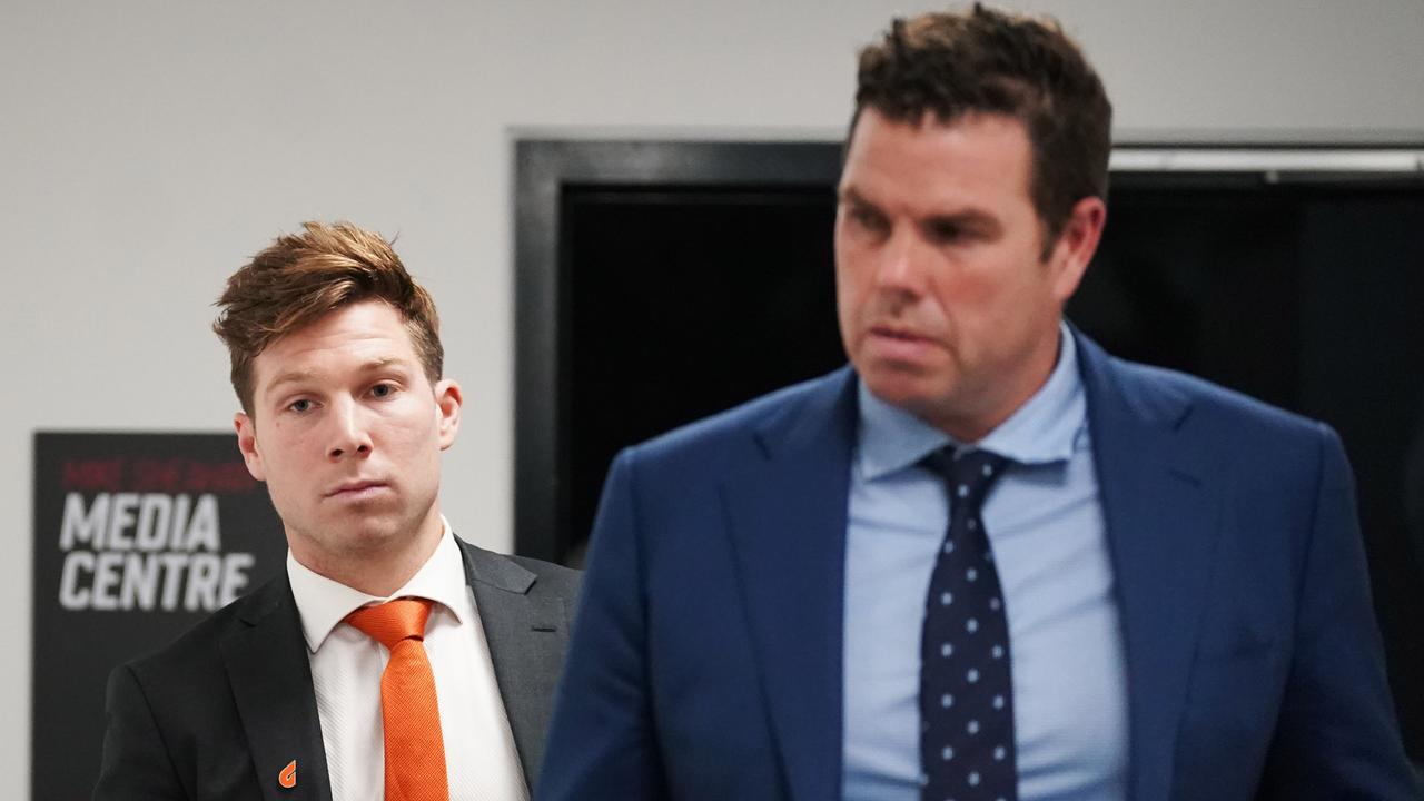 GWS Giants player Toby Greene leaves the AFL tribunal with manager Paul Connors in Melbourne.