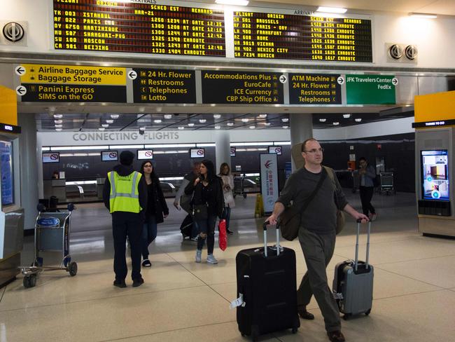 Passengers arrive from international flights at John F. Kennedy International Airport in New York. Picture: AFP