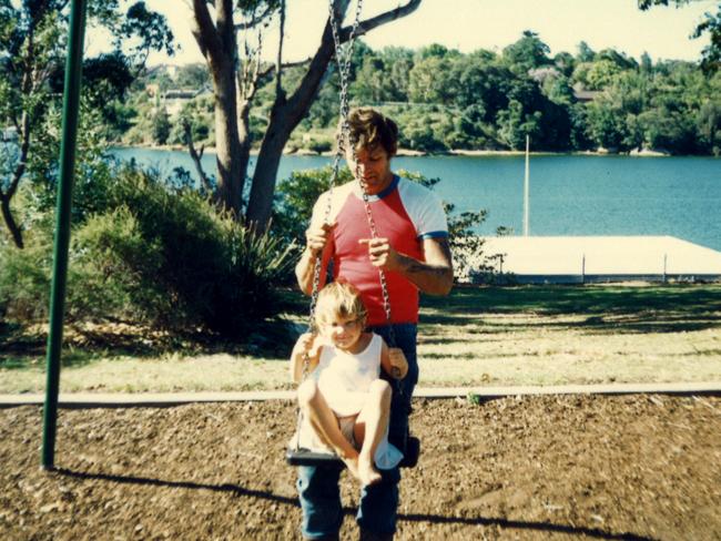 Allan pushes his daughter Nina in a swing in Sydney in 1990.