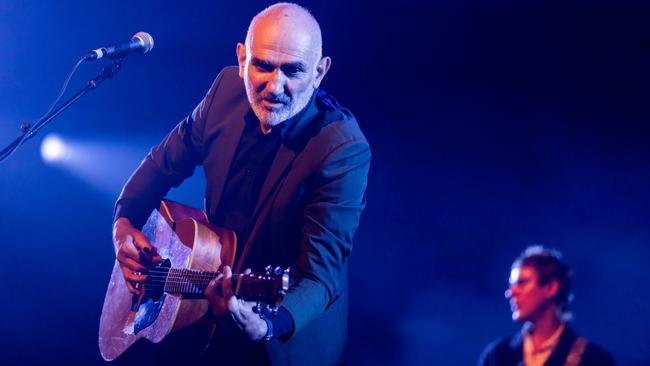 Paul Kelly performing at Bluesfest 2022 while backed by fill-in bassist Richard Bradbeer (right). Picture: supplied