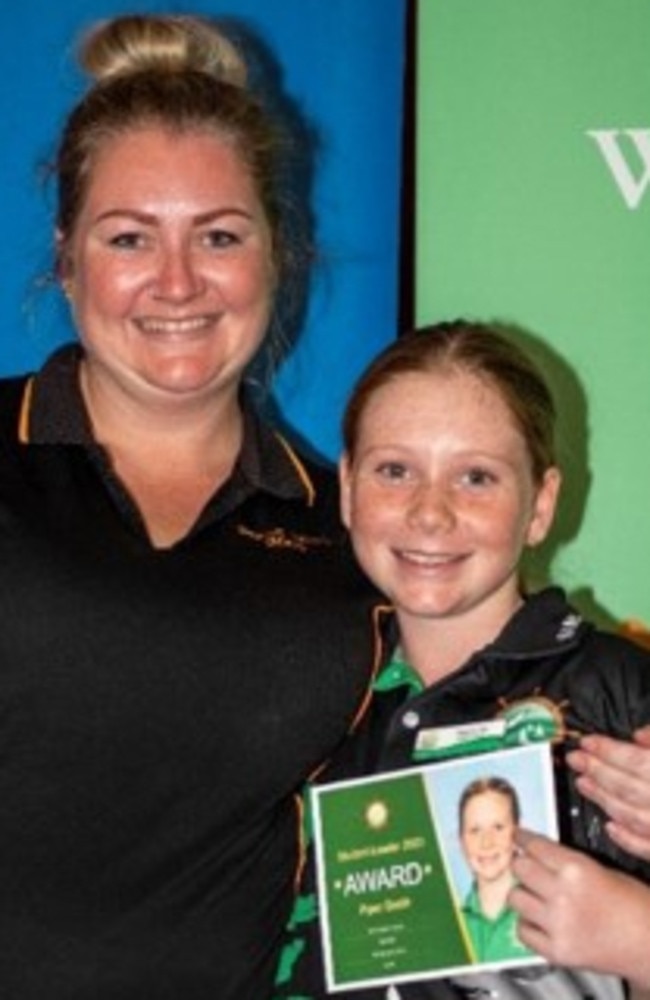 Piper wants to either be a professional WNRL player or be a tradie when she grows up. Photo taken with her mum.