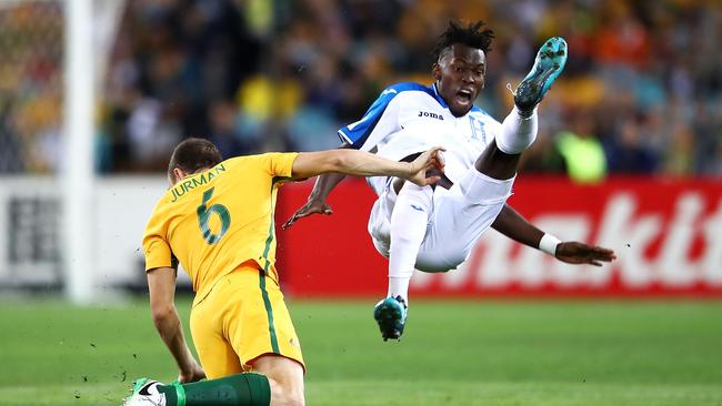 Matthew Jurman of Australia tackles Alberth Elis of Honduras during the 2018 FIFA World Cup Qualifiers