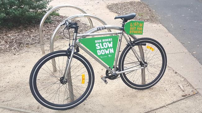 VicRoads and Melbourne councils are running a safety campaign telling cyclists to slow down and watch out for pedestrians on shared paths. They will use "promo" bikes with warning messages.