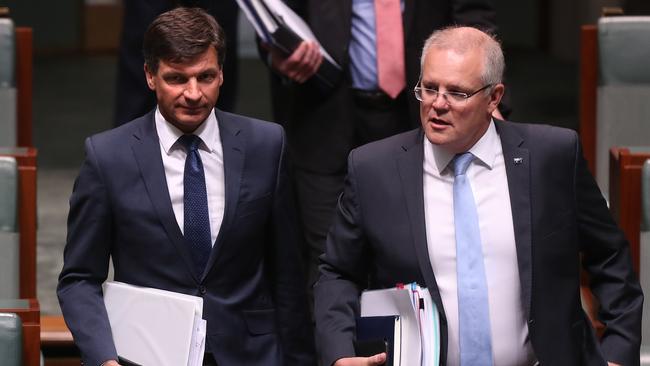 Energy Minister Angus Taylor, left, and PM Scott Morrison arrive for Question Time. Picture: Kym Smith