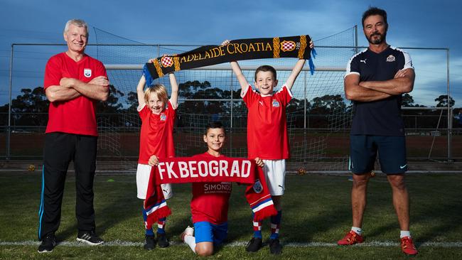 Former Beograd Woodville star Adrian Santrac and ex-Adelaide Croatia goalkeeper Peter Blazincic with junior players Oliver, Jake and Kaspar. Picture: Matt Loxton