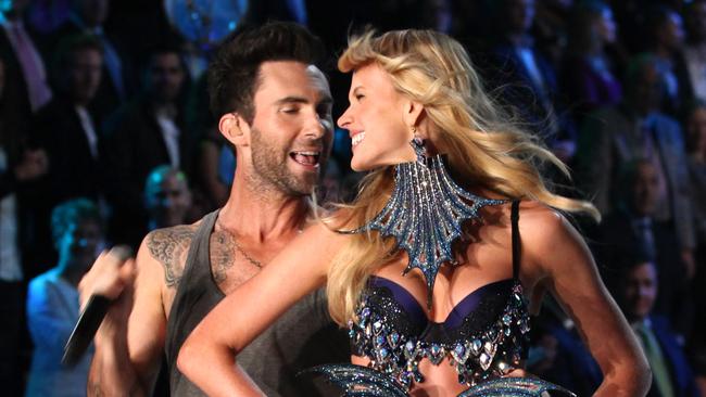 Then-couple Adam Levine and Anne Vyalitsina at the 2011 show. Picture: VS / Splash News Splash News and Pictures.