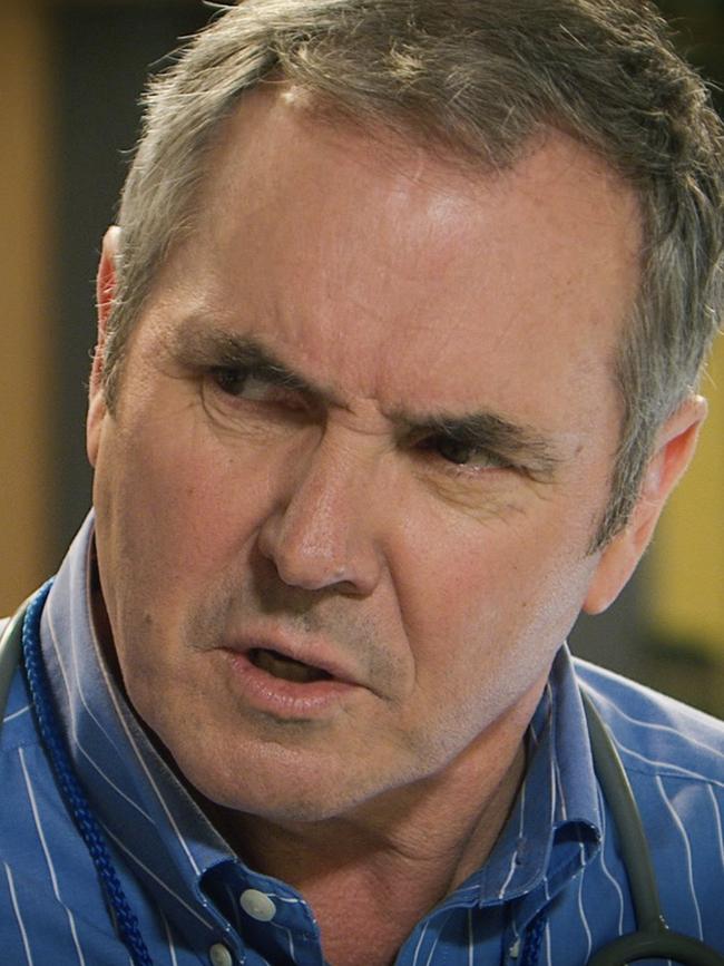 Fletcher as Dr Karl Kennedy.