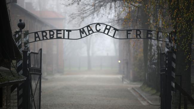 The infamous German inscription that reads 'Work Makes Free' at the main gate of the Auschwitz I extermination camp on November 15, 2014. Picture: Christopher Furlong/Getty Images)