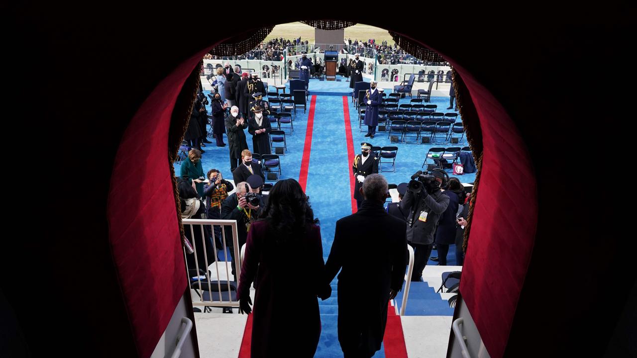 Former US First Lady Michelle Obama (left) and former US President Barack Obama arrive for the inauguration of Joe Biden. Picture: AFP