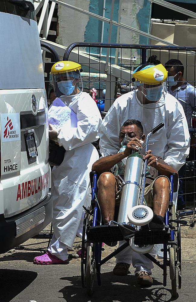 Honduras hasn’t even managed to vaccinate 1 per cent of its population, ringing alarm bells for a potential health disaster. Picture: Orlando Sierra/AFP