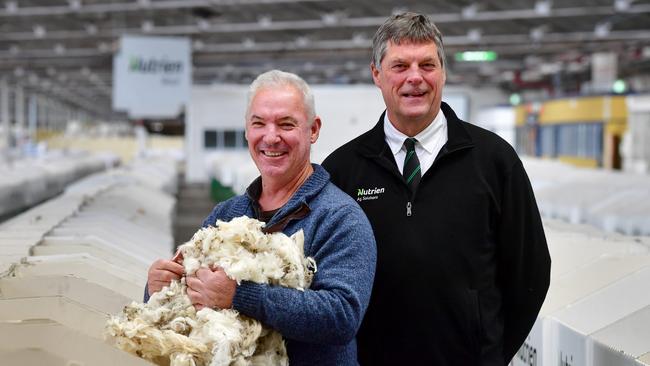 Wool grower Tim Carland from Beaufort with Ted Wilson fine wool specialist from Nutrien at the Melbourne wool sale on Tuesday. Picture: Zoe Phillips