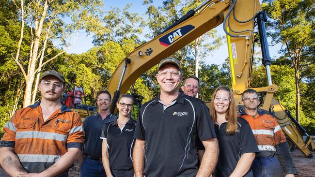 Black Cat Civil Founder Jai Tomlinson with some of his Nambour Head Office Staff, who have picked up the Queensland Resources Council Award for exceptional indigenous business. Picture: Lachie Millard.