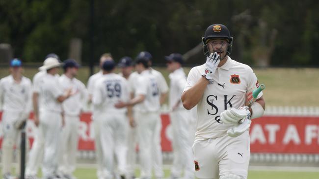 Carlton celebrates the wicket of Jonathan Merlo. Picture: Valeriu Campan