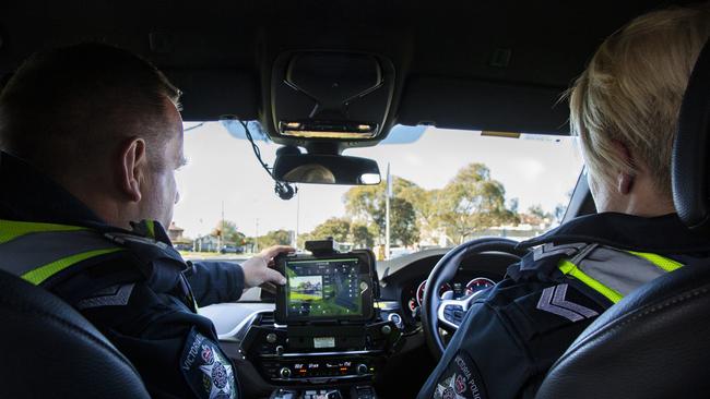 Highway Patrol officers using the Mobile Automatic Number Plate Recognition (ANPR) technology to detect offences. Picture: Victoria Police.