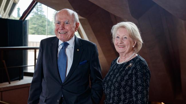 John and Janette Howard arrive for the state memorial for Barry Humphries at The Sydney Opera House on Friday . Picture: NCA NewsWire / Nikki Short