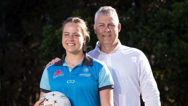 Netballer Audrey Little and her father, former Wallaby Jason Little. Audrey has been selected as part of the first ever Swifts Academy.