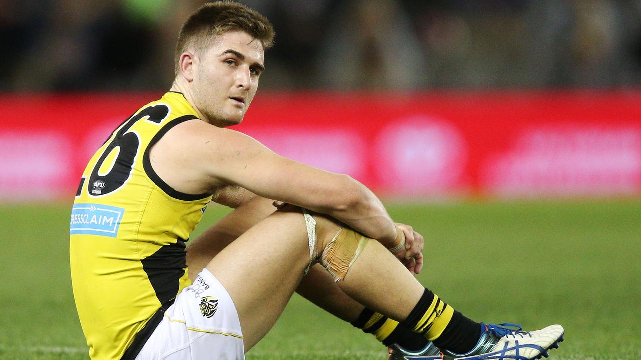 Anthony Miles looks dejected after the VFL grand final loss in 2017.