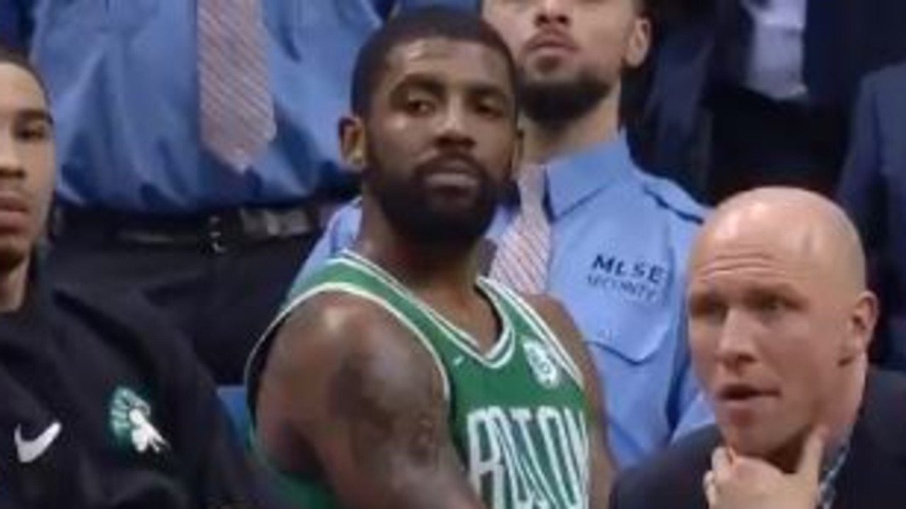 Kyrie Irving watches on as Celtics get blown out.