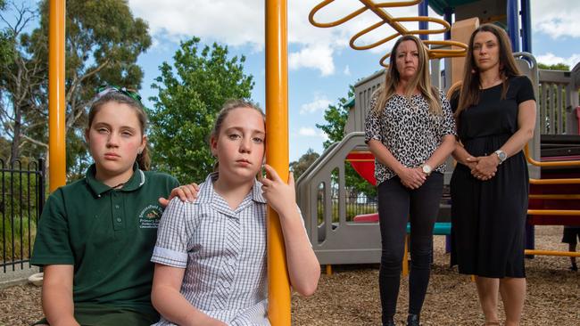 Emme, 11, (left) and Milly 10 with mums Nikki and Jennifer (right) have been left shaken after the brazen alleged attack. Picture: Jason Edwards