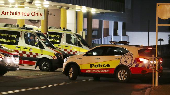 Crash Investigators arrive at Liverpool Hospital to investigate the fatal truck accident. Picture: Steve Tyson