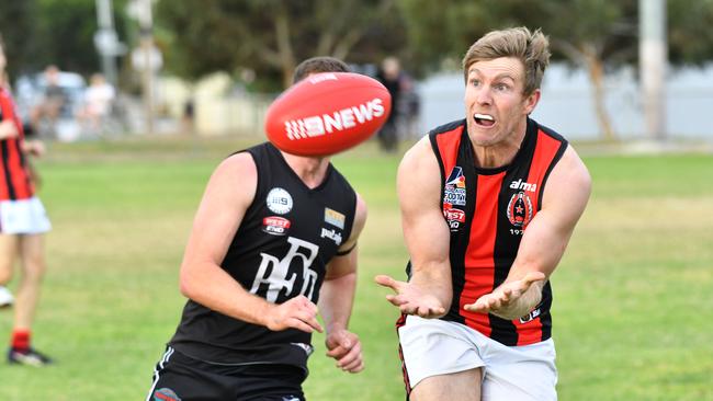 Ex-Sturt captain Michael Coad about to mark the footy during Rostrevor Old Collegians’ first loss of the season against Port District on Saturday. Picture: AAP/Keryn Stevens.