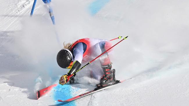 Nina O'Brien hits the gate at high speed. Picture: Joe Klamar/AFP