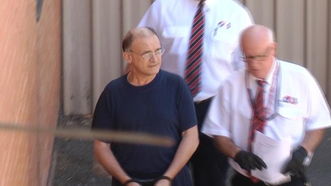 Domenic Perre being led into Adelaide Magistrates Court. Picture: Nine News