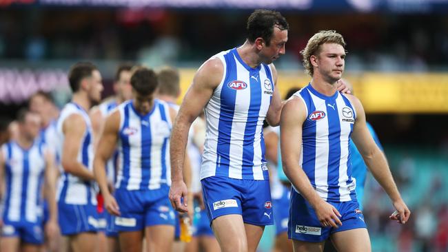 Jason Horne-Francis, pictured right with Todd Goldstein, had a difficult first season in the AFL. Picture: Getty Images