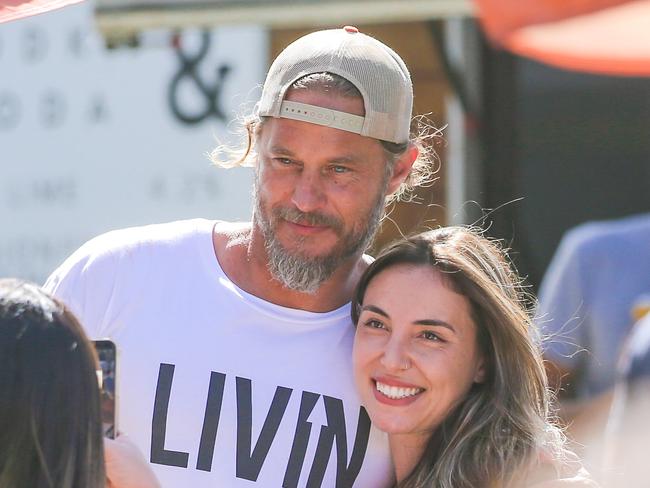 Vikings Star and ÃTravlaÃ founder Travis Fimmell at the  Surf Open at Burleigh Heads.Picture: Glenn Campbell