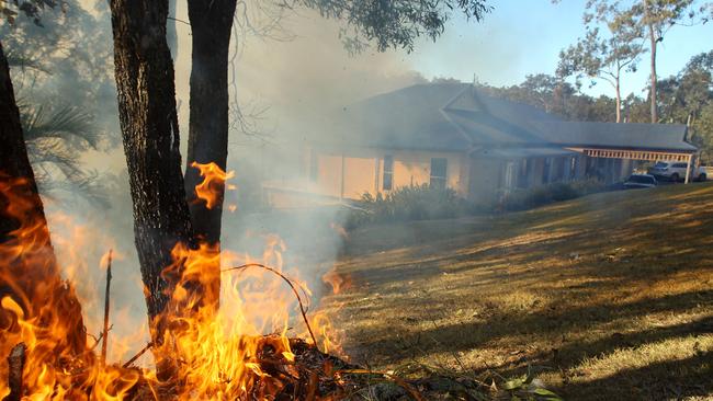 A bushfire threatening homes in the Gold Coast hinterland. Picture: Scott Fletcher.