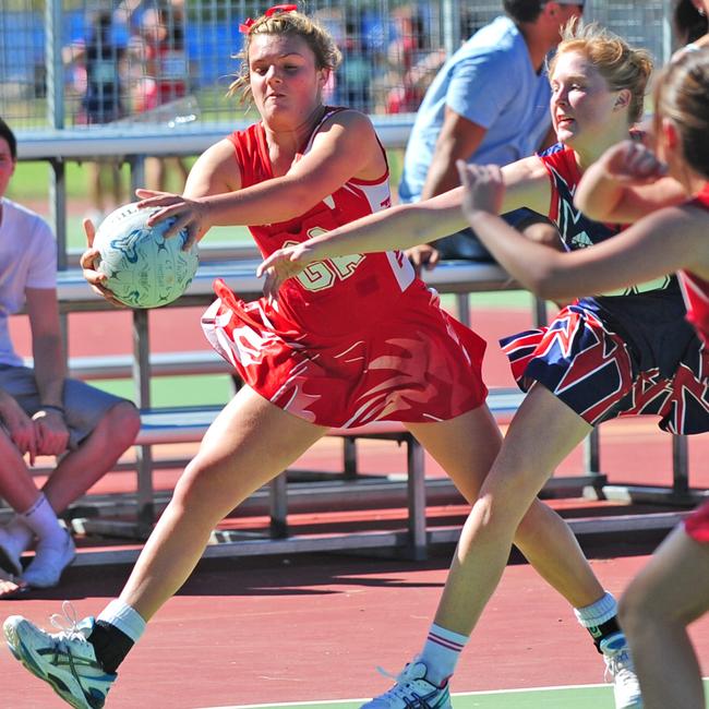 Netball Feds v Memo.Federals Jordann Hickey takes possession of the ball in 2010.