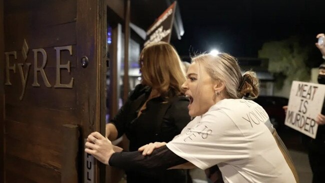 Tash Peterson was confronted by patrons and eventually chef John Mountain as she protested the Fyre restaurant in Perth. Picture: Facebook