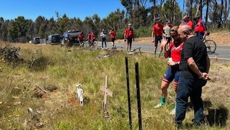 Friends putting in Greg Burley's memorial.