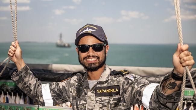 Able Seaman Communication Information Systems Lance Sapanghila operates the signal flags on board HMAS Warramunga Picture: Department of Defence.