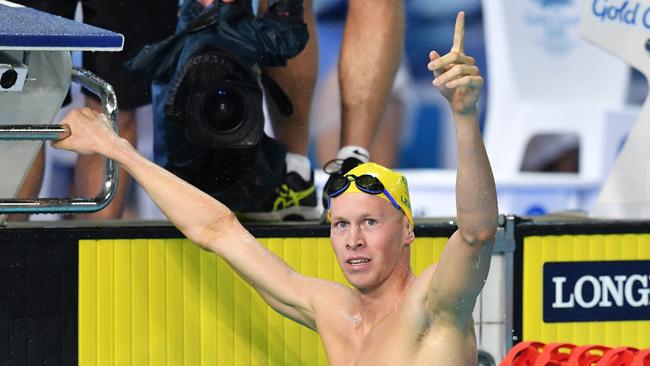 Clyde Lewis of Australia celebrates after winning the Men's 400m Inidividual Medley.