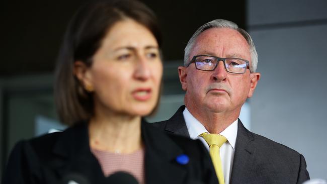 Health Minister Brad Hazzard looks on during the press conference as Premier Gladys Berejiklian addresses the media. Picture: NCA NewsWire / Gaye Gerard