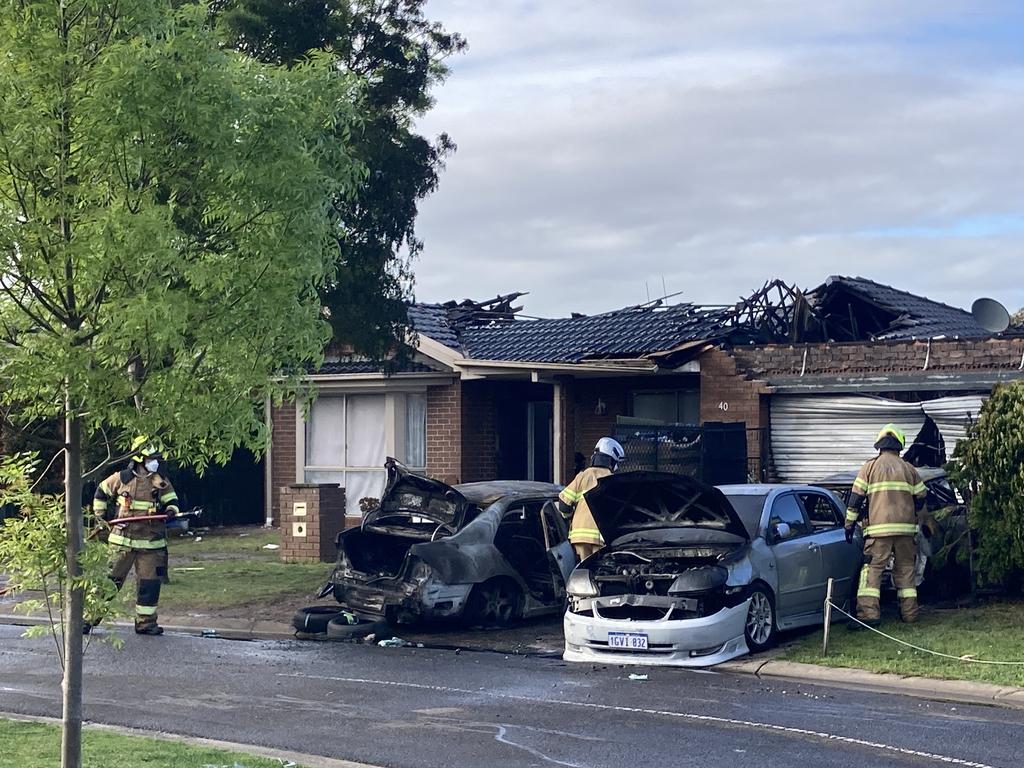 Neighbours said they saw three men set the cars on fire. Picture: Angus McIntyre