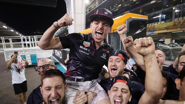 Verstappen celebrates with his team after the dramatic final-lap victory. Picture: Getty