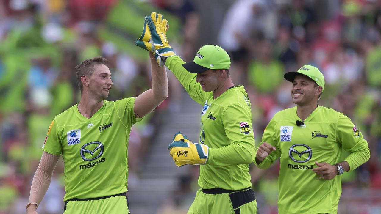 Clearly the best bowler this season, Daniel Sams of the Thunder is congratulated for yet another wicket