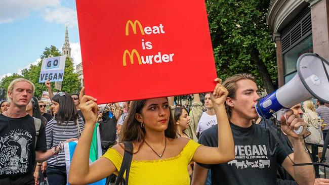 UNITED KINGDOM, London: Vegan activists hold sign-boards and chanted slogans as they marched on the Houses of Parliament and towards Hyde Park in London, United Kingdom on September 02, 2017 to fight animal abuse and oppression. (AAP Image/CrowdSpark/See LI). Picture: See LI