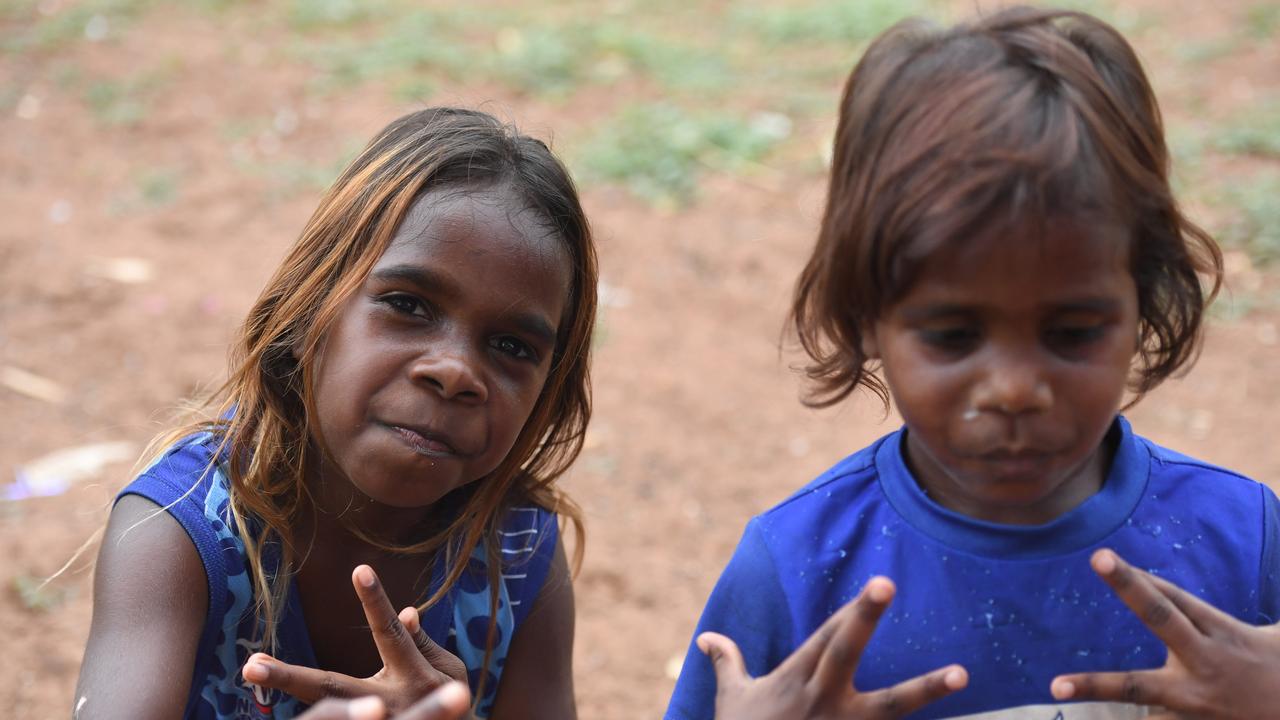 Rockhole residents take their first steps outside after a week long hard lockdown. Picture: Amanda Parkinson