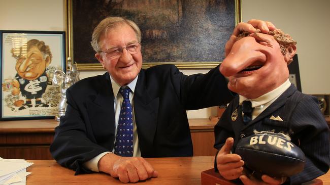 Elliott remained a committed Carlton man and had caricatures of himself in his office. Picture: David Caird