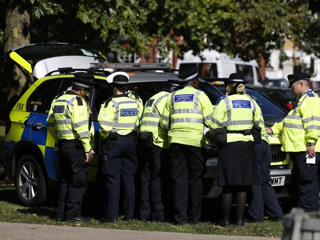 Police congregate at the scene of a bomb blast in London. Picture: AP/Kirsty Wigglesworth