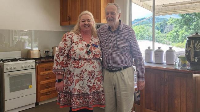 Hammond Care regional manager Jodi Peel with Roger Manby in his rebuilt kitchen.