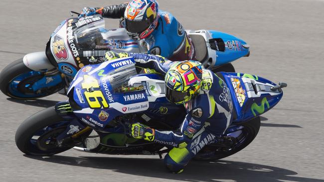 RIO HONDO, SANTIAGO DEL ESTERO - APRIL 01: Valentino Rossi of Italy and Movistar Yamaha MotoGP and Jack Miller of Australia and Marc VDS Racing Team (up) round the bend during the MotoGp of Argentina - Free Practice at Termas De Rio Hondo Circuit on April 01, 2016 in Rio Hondo, Argentina. (Photo by Mirco Lazzari gp/Getty Images)