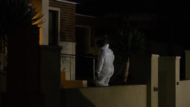 A forensics cleaning team at the Biancofiores’ home. Picture: Sarah Matray